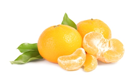 Photo of Tasty ripe tangerines with leaves on white background