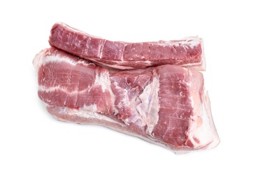 Photo of Pieces of raw pork belly isolated on white, top view