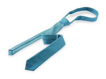 Photo of One light blue necktie isolated on white, above view