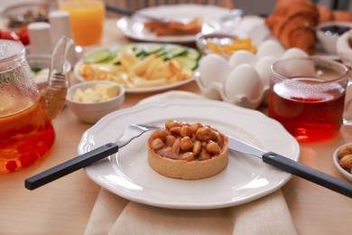 Dishes with different food on table indoors. Luxury brunch