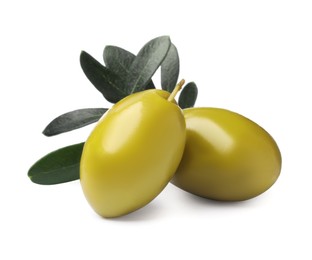 Photo of Olives with green leaves on white background