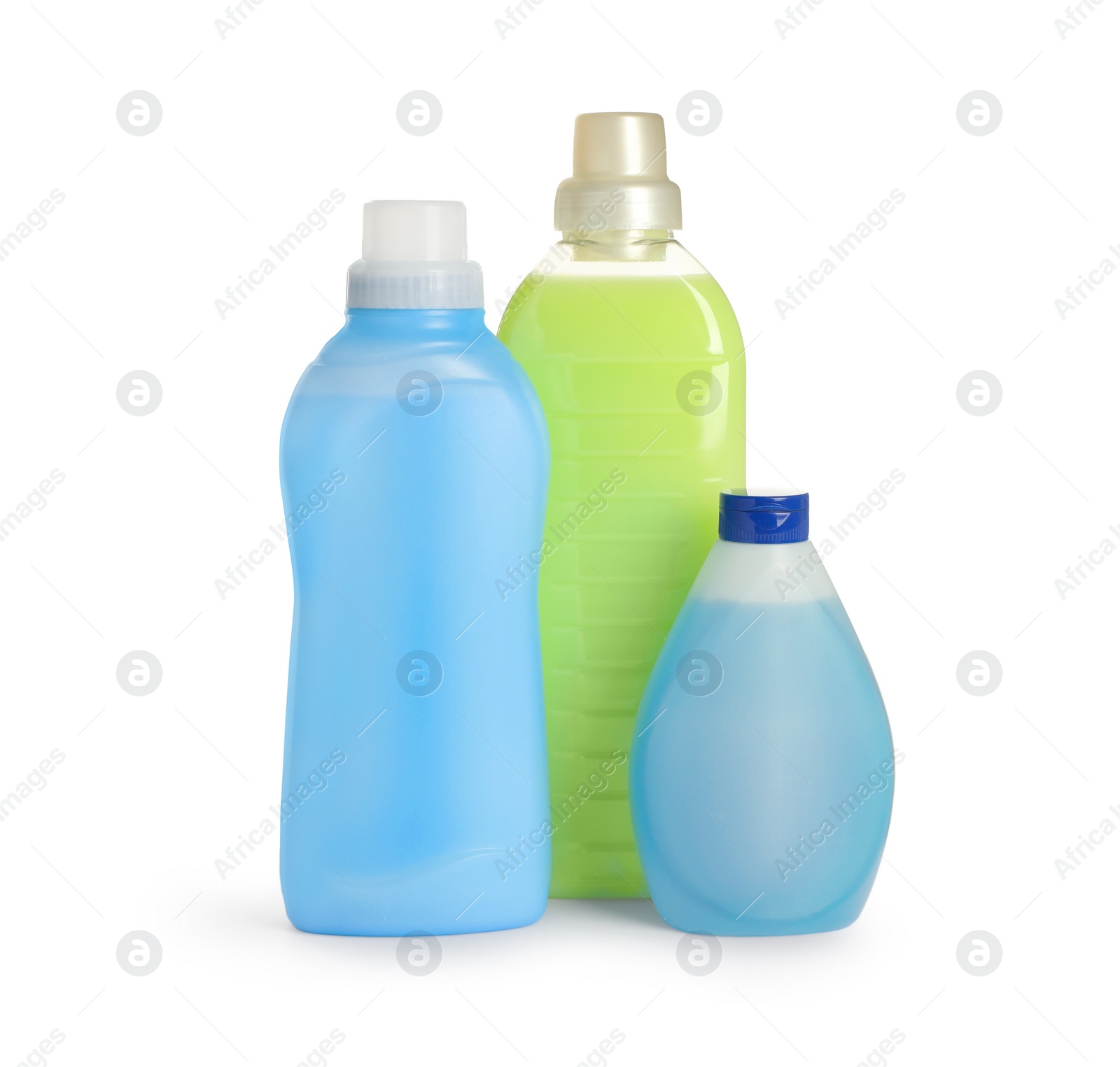 Photo of Different bottles with detergents on white background