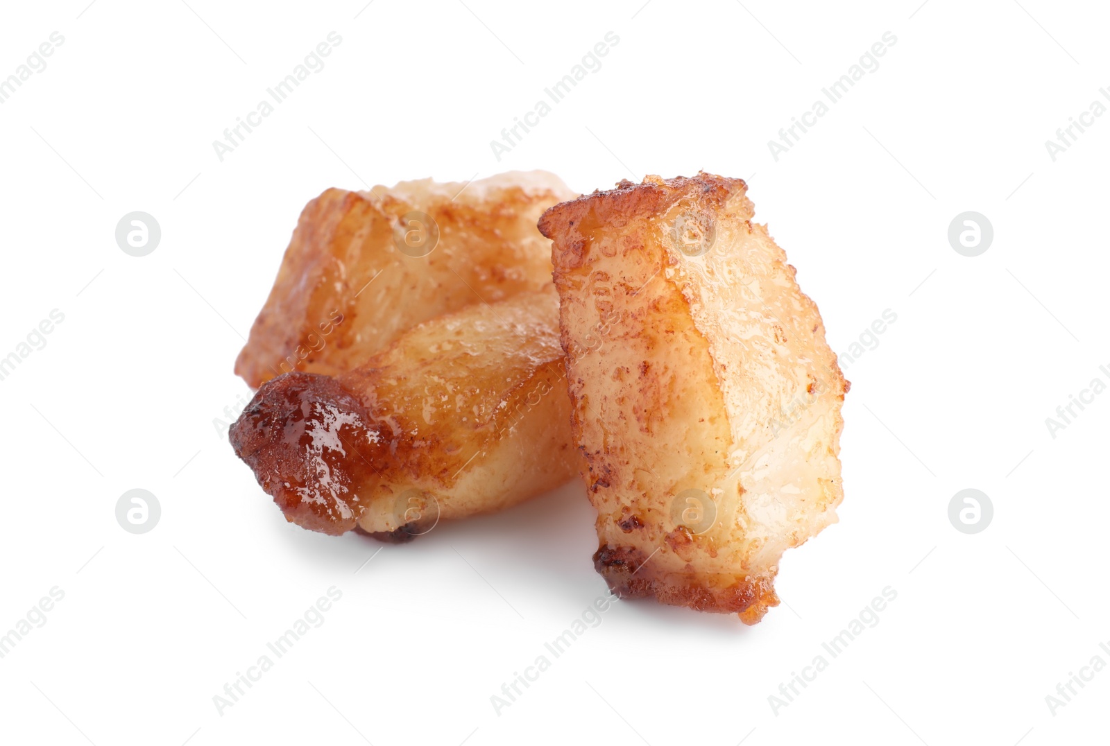 Photo of Tasty fried cracklings on white background. Cooked pork lard