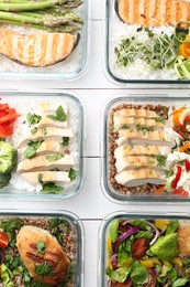 Healthy meal. Containers with different products on white wooden table, flat lay