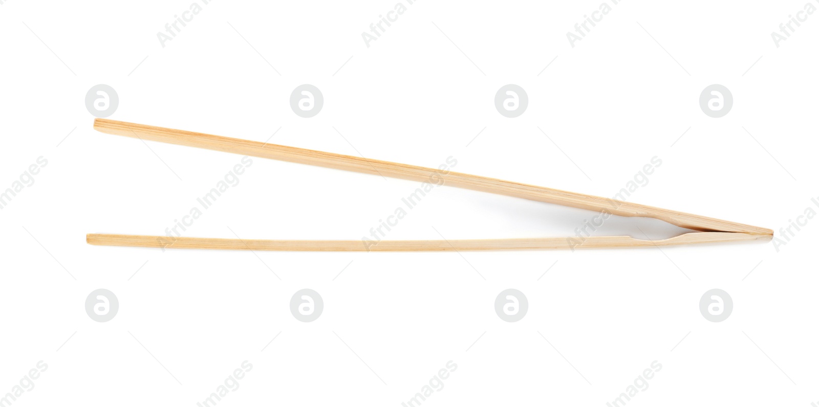 Photo of Tongs made of bamboo on white background, top view