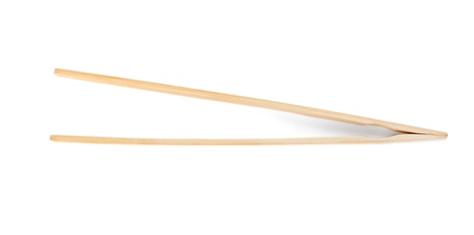 Photo of Tongs made of bamboo on white background, top view