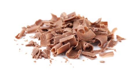 Photo of Pile of tasty chocolate shavings isolated on white