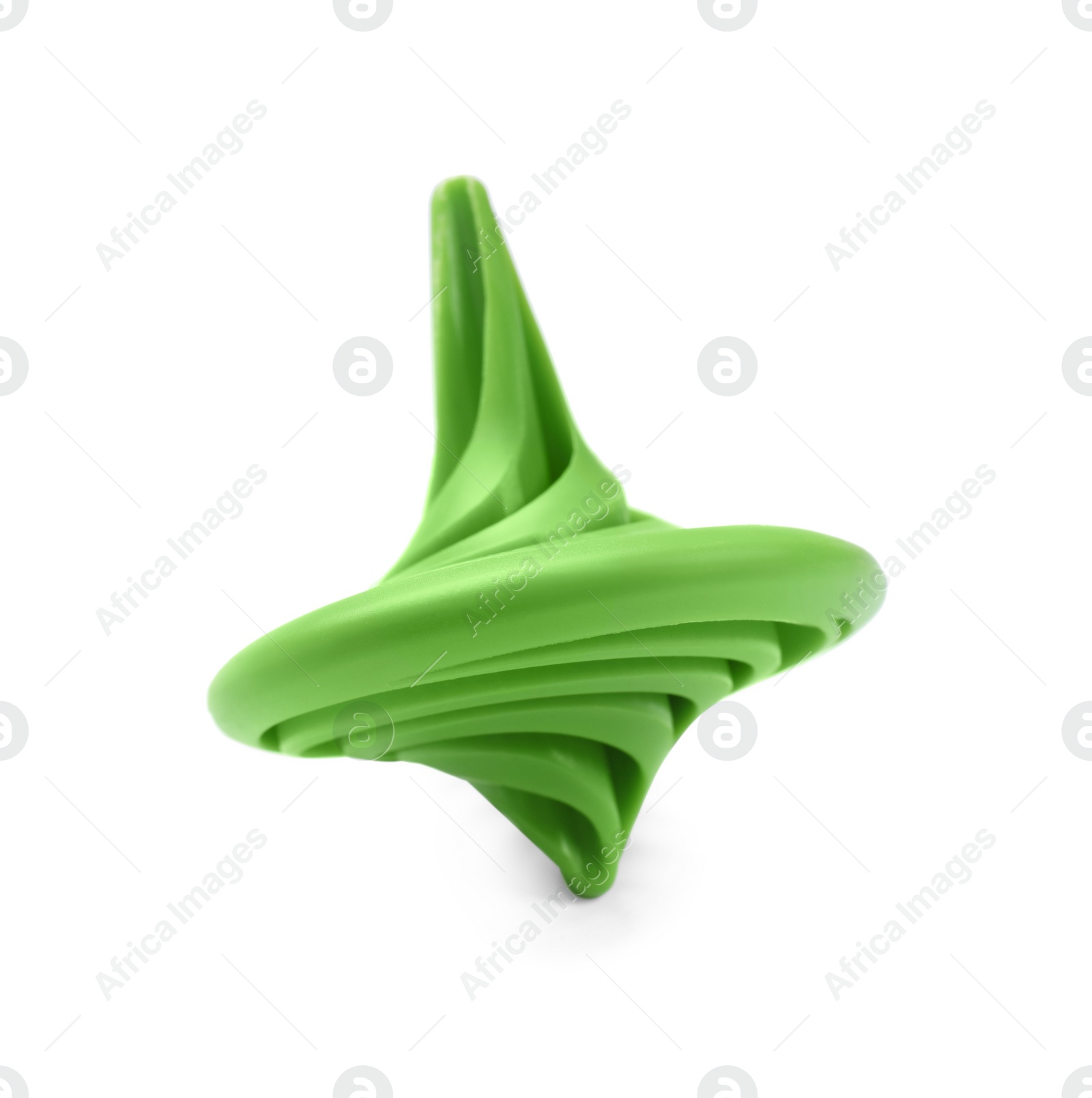 Photo of One green spinning top isolated on white