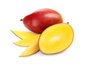 Photo of Delicious ripe mangoes on white background. Tropical fruit