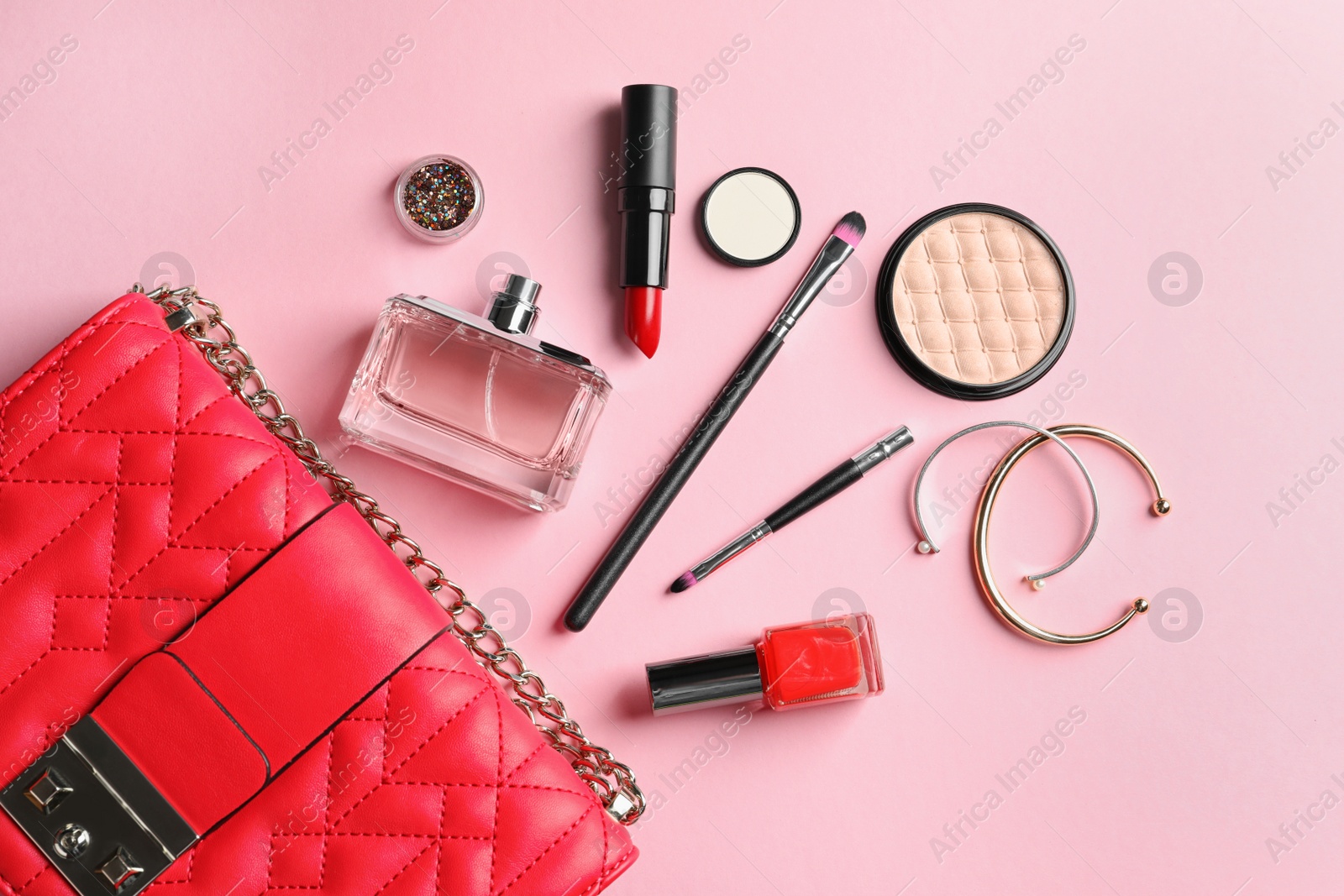 Photo of Flat lay composition with decorative cosmetics on color background