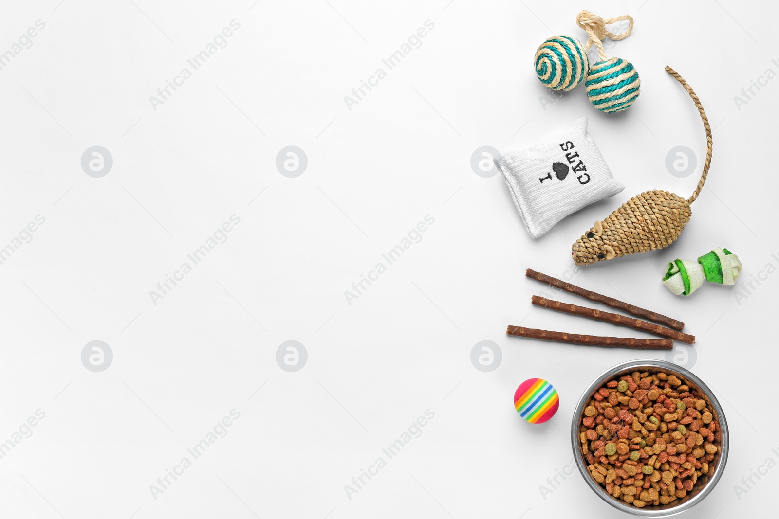 Photo of Flat lay composition with cat accessories and food on white background