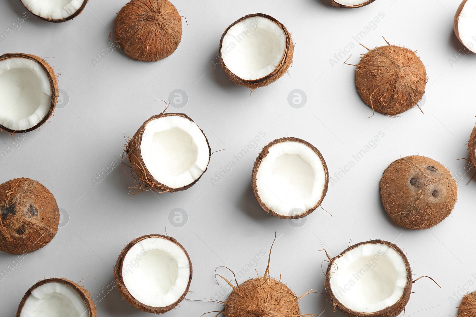 Photo of Coconut pattern on white background, top view