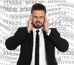 Image of Businessman suffering from depression and words STRESS on white background