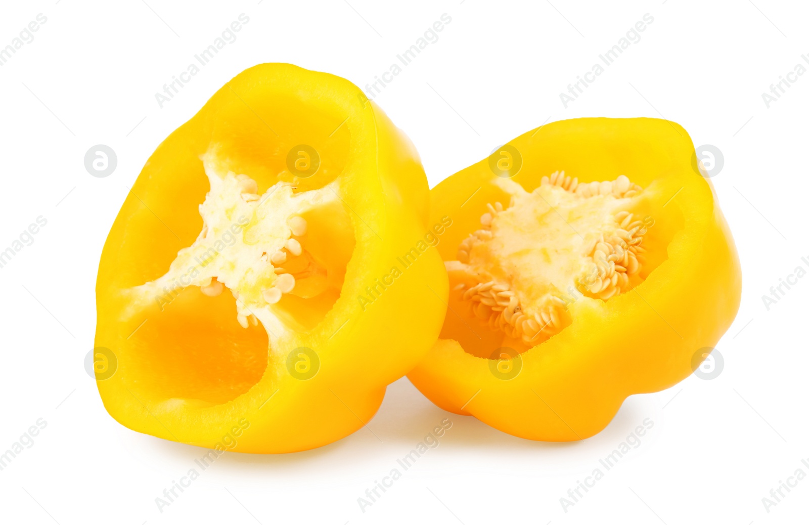 Photo of Halves of yellow bell pepper isolated on white