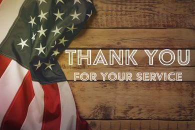 Image of Text THANK YOU FOR YOUR SERVICE and American flag on wooden background, top view. Memorial day