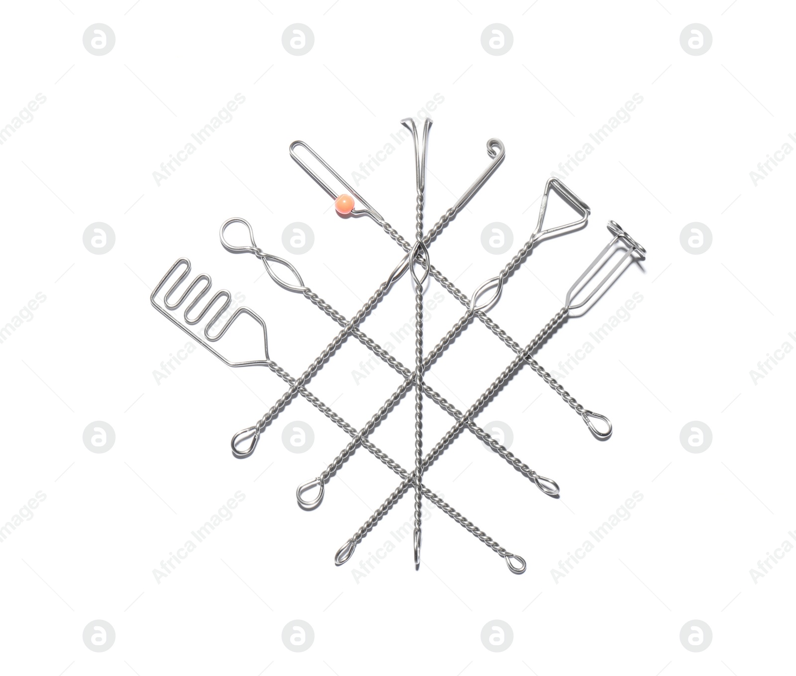 Photo of Set of logopedic probes on white background, top view. Speech therapist's tools