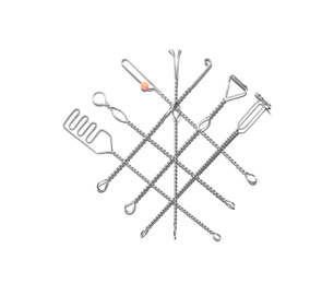 Set of logopedic probes on white background, top view. Speech therapist's tools