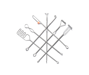 Photo of Set of logopedic probes on white background, top view. Speech therapist's tools