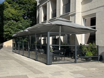 Photo of WARSAW, POLAND - JULY 17, 2022: Beautiful view of modern cafe with outdoor terrace