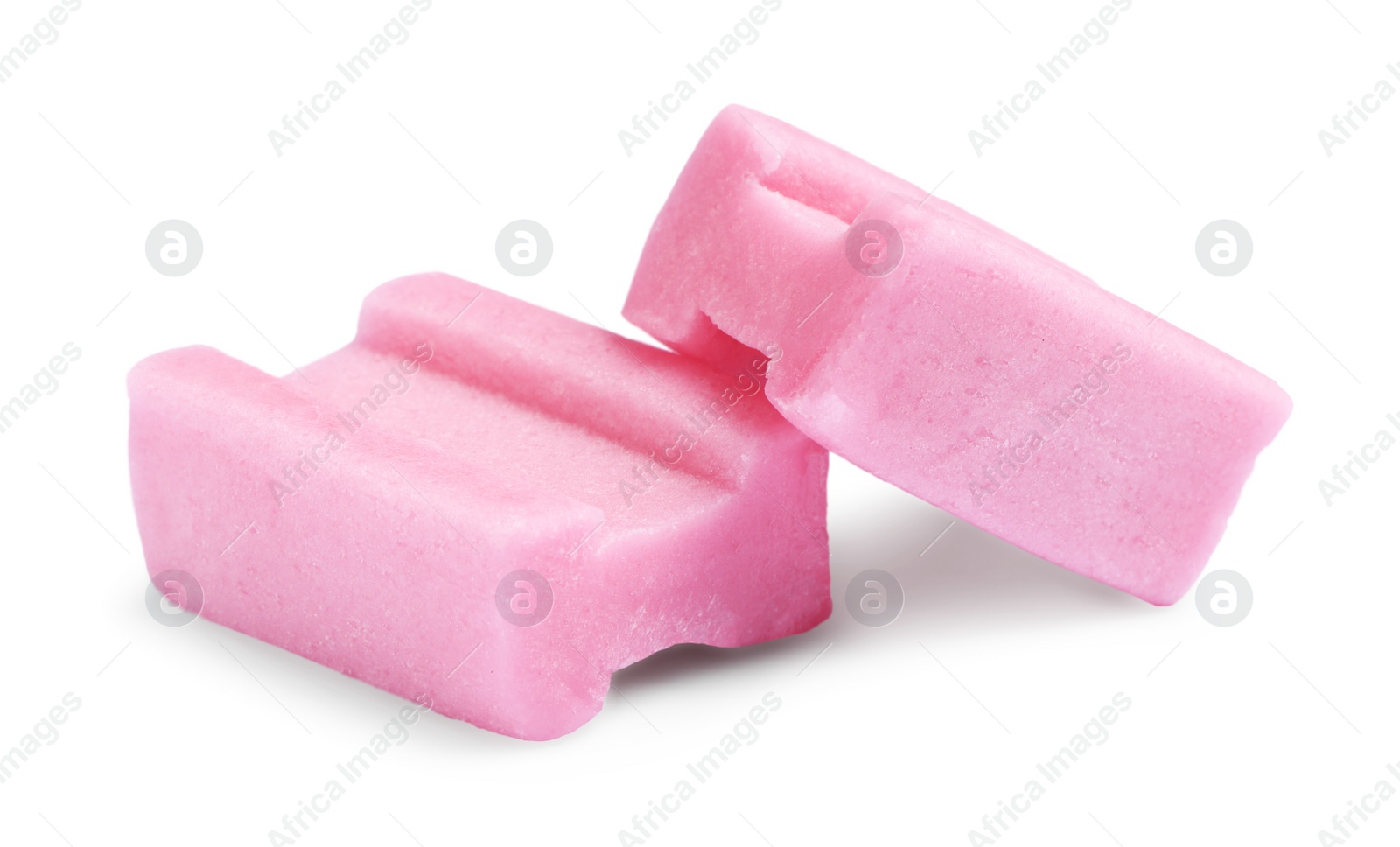 Photo of Tasty pink bubble gums isolated on white