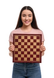 Happy woman with chessboard on white background