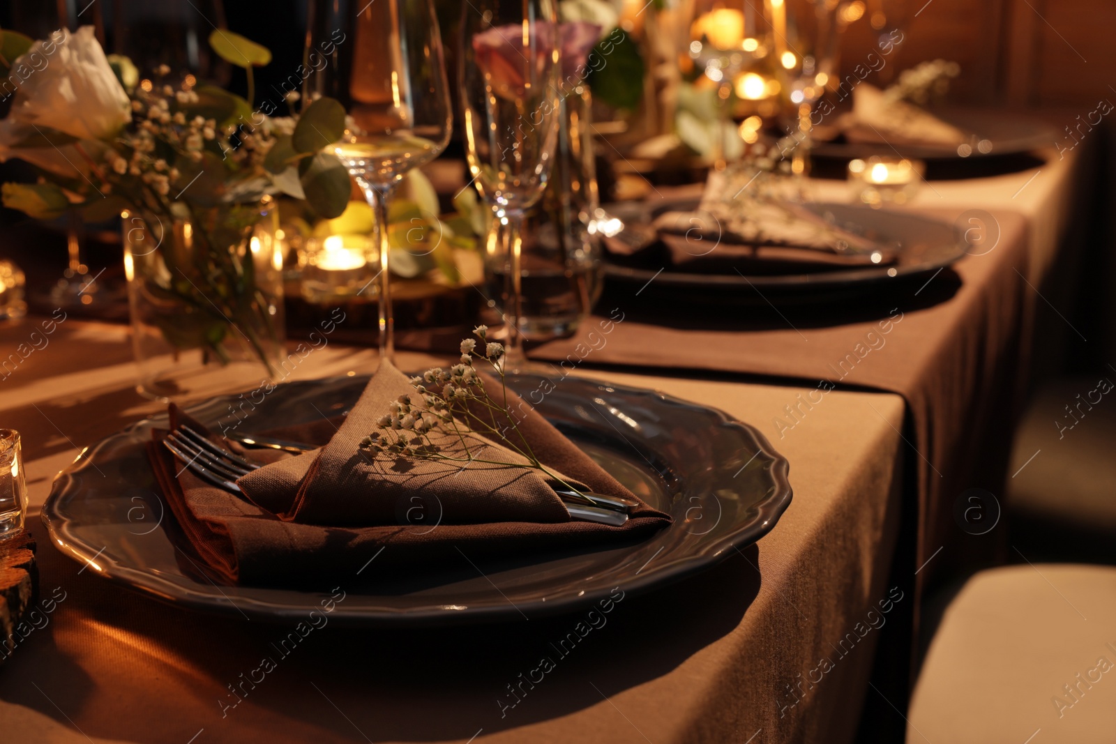 Photo of Elegant table setting with beautiful floral decor