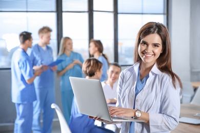 Smart medical student with her classmates in college