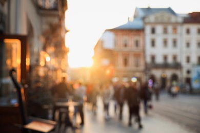 Blurred view of people walking on city street