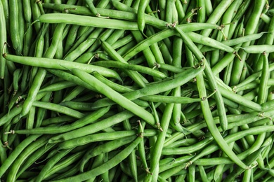 Photo of Fresh green beans as background, top view