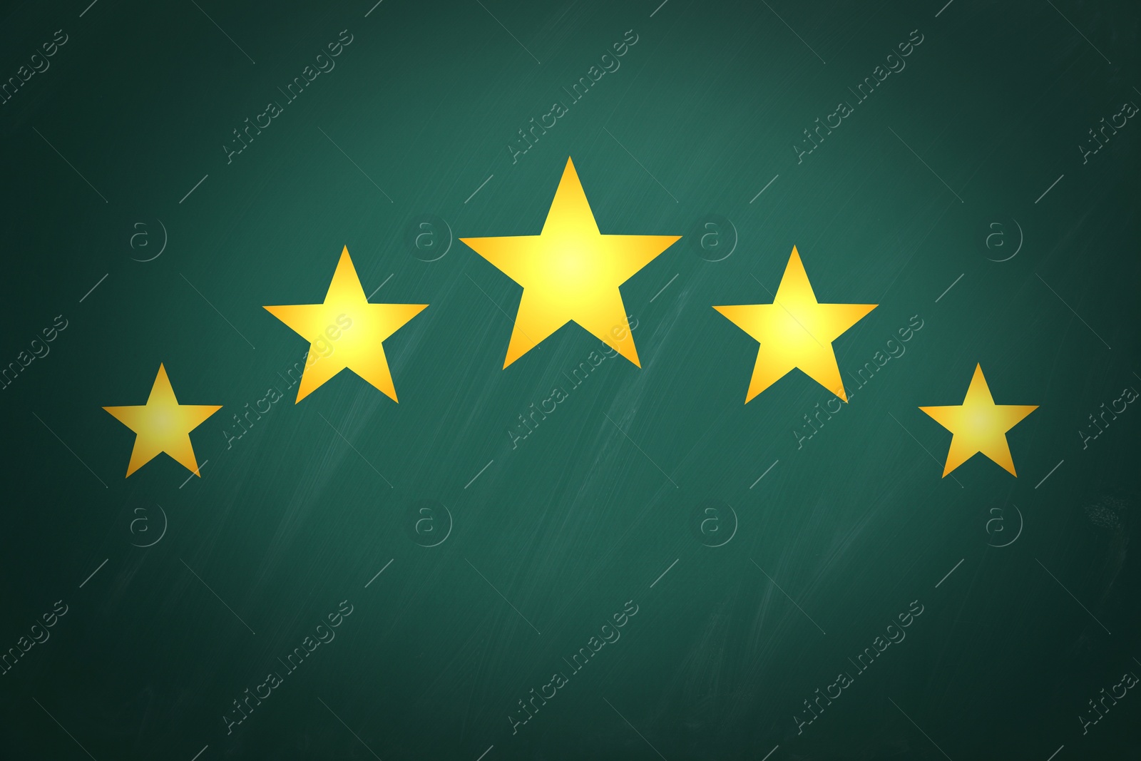 Image of Quality evaluation. Golden stars on green chalkboard