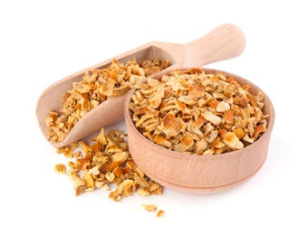 Bowl and scoop with dried orange zest seasoning isolated on white