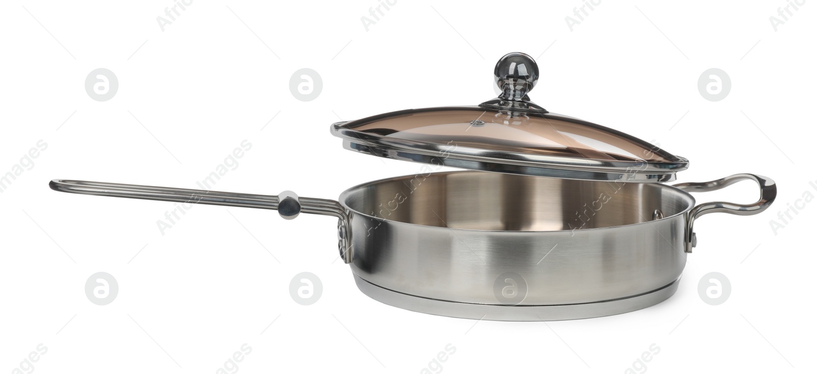 Photo of New stainless steel frying pan with glass lid isolated on white