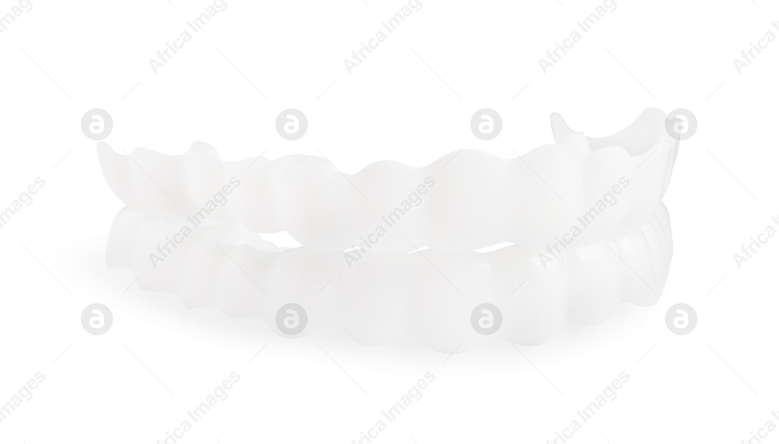 Photo of Dental mouth guards on white background. Bite correction