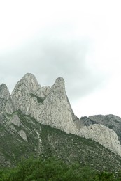 Photo of Picturesque landscape with high mountains under gloomy sky