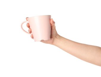 Woman holding pink cup on white background, closeup