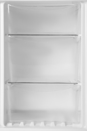 Modern open refrigerator with empty shelves, closeup