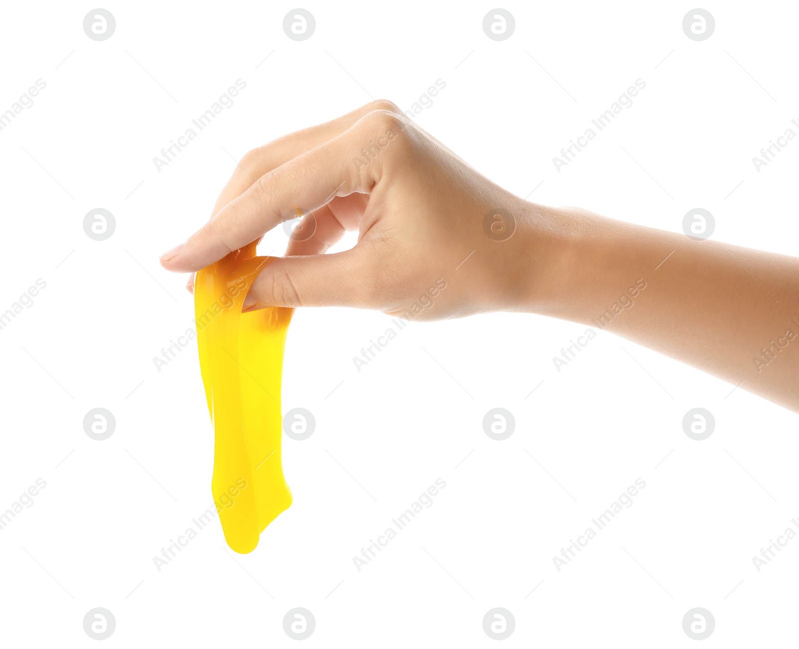 Photo of Woman playing with yellow slime isolated on white, closeup. Antistress toy