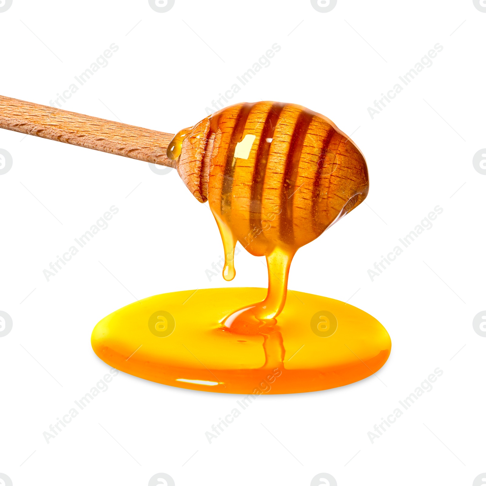 Image of Natural honey dripping from dipper on white background