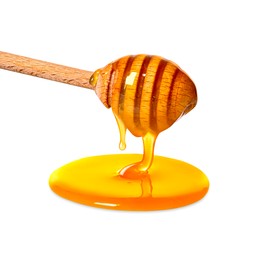 Natural honey dripping from dipper on white background