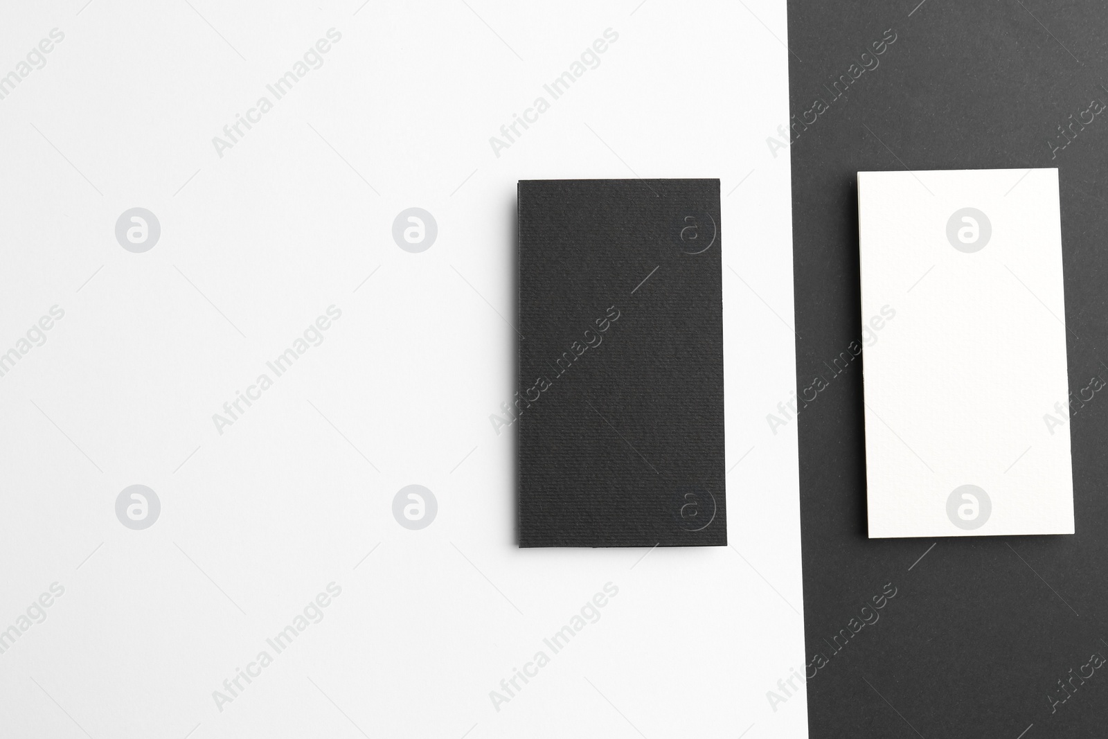 Photo of Blank business cards on color background, flat lay. Mockup for design