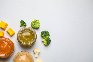 Photo of Healthy baby food and ingredients on white background, top view