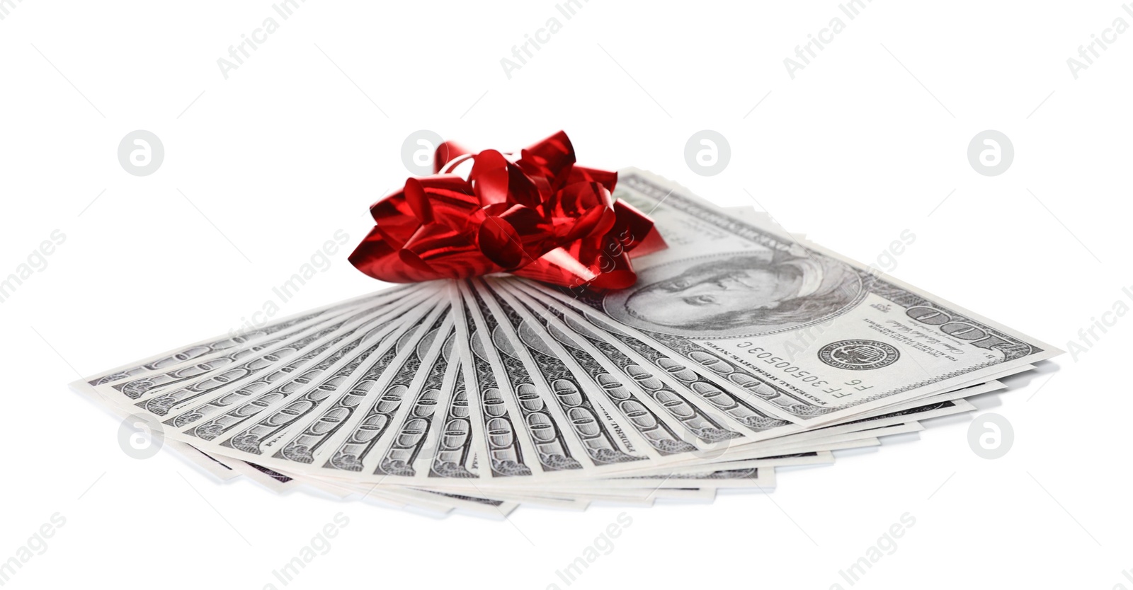 Photo of Fan of dollar banknotes with bow on white background