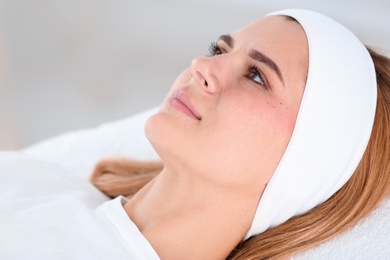 Woman after face biorevitalization procedure in salon, closeup. Cosmetic treatment