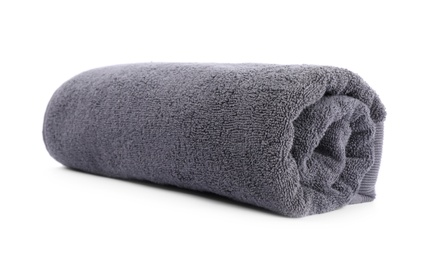 Photo of Rolled soft terry towel isolated on white