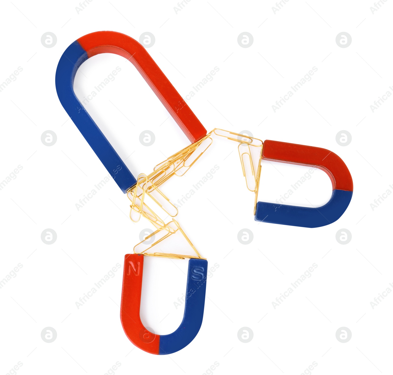 Photo of Magnets attracting paper clips on white background, top view