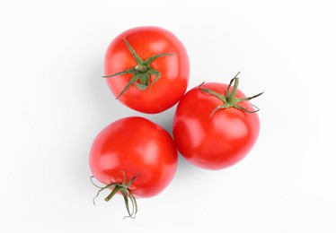 Ripe tomatoes on white background, top view