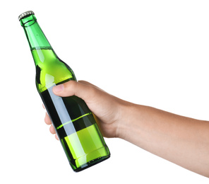 Photo of Man holding green bottle with beer on white background, closeup