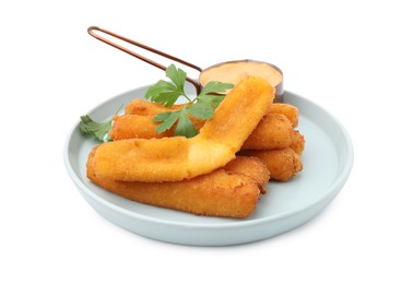 Photo of Tasty fried mozzarella sticks served with sauce and parsley isolated on white