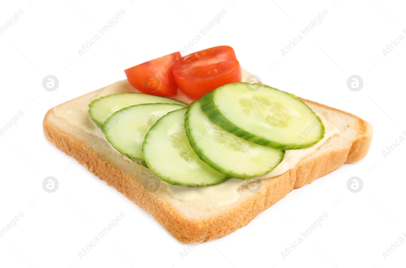 Photo of Slice of bread with spread and vegetables on white background
