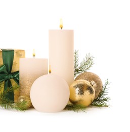 Beautiful burning candles with Christmas decor on white background